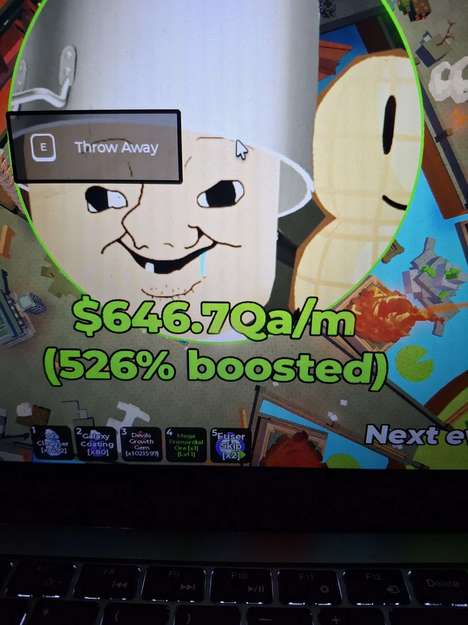 A pet boost value photographed from the Sell Ores interface.